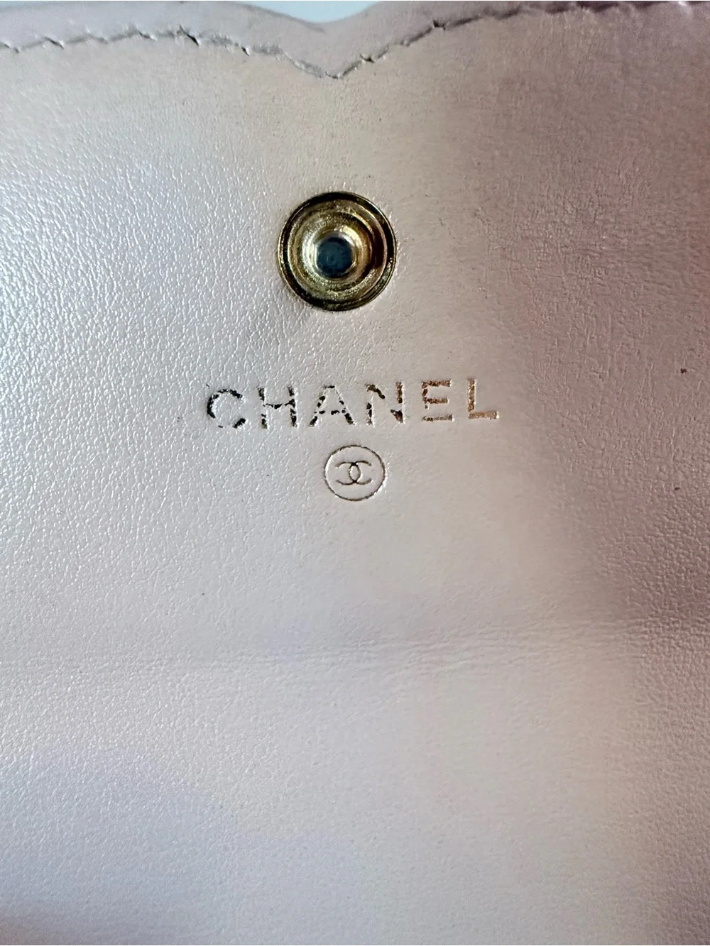 CHANEL Filigree Beige Quilted Leather Wallet with Black Trim and Gold Accents